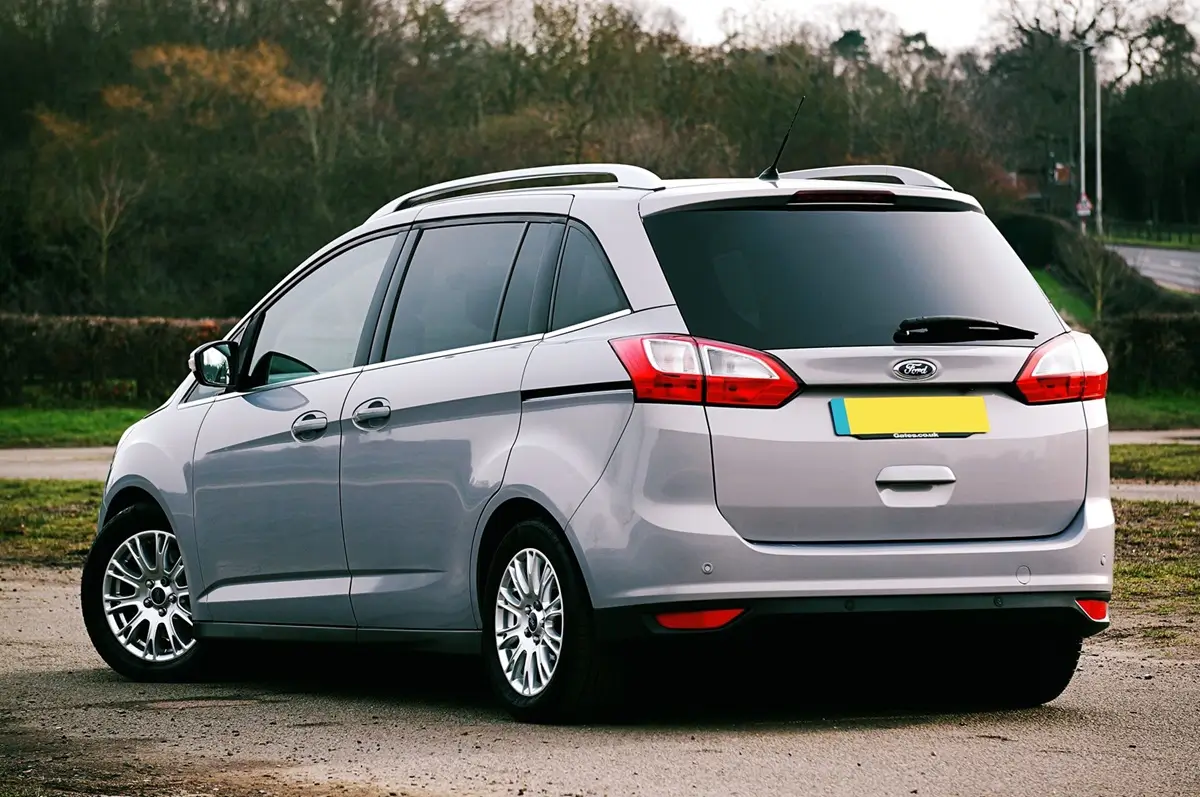 Fleet Dark grey mpv people carrier parked at the kerb